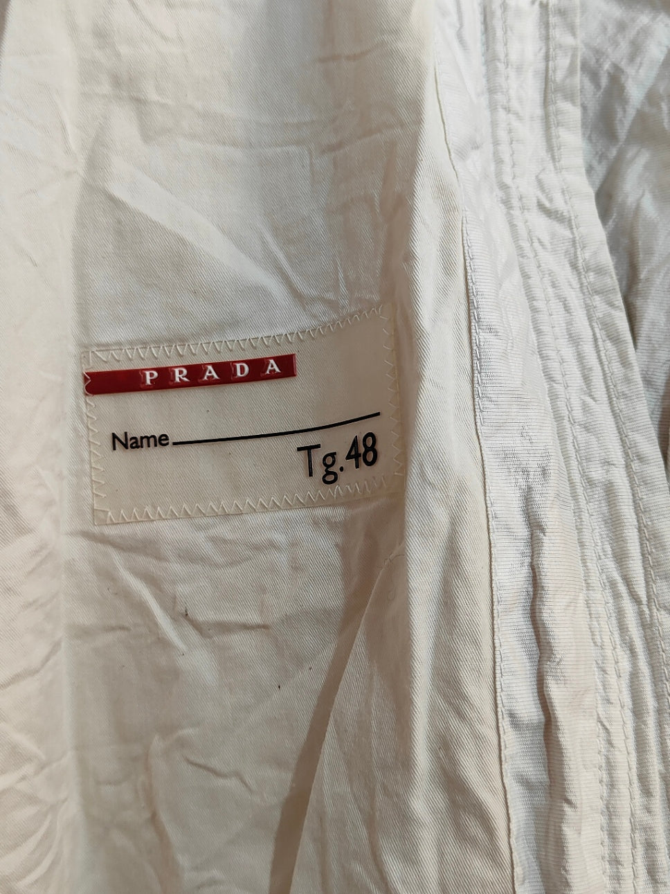 Giacca Prada bianca la Vento  in tessuto tecnico con zip – Taglia 48  EURO 25,00